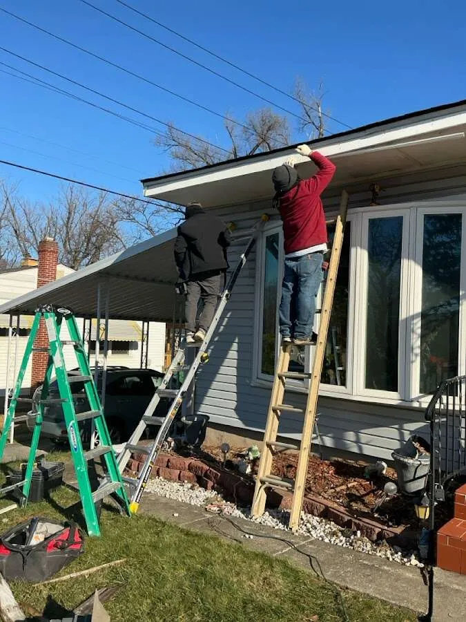 Restoration crew performing exterior repair in Gallatin